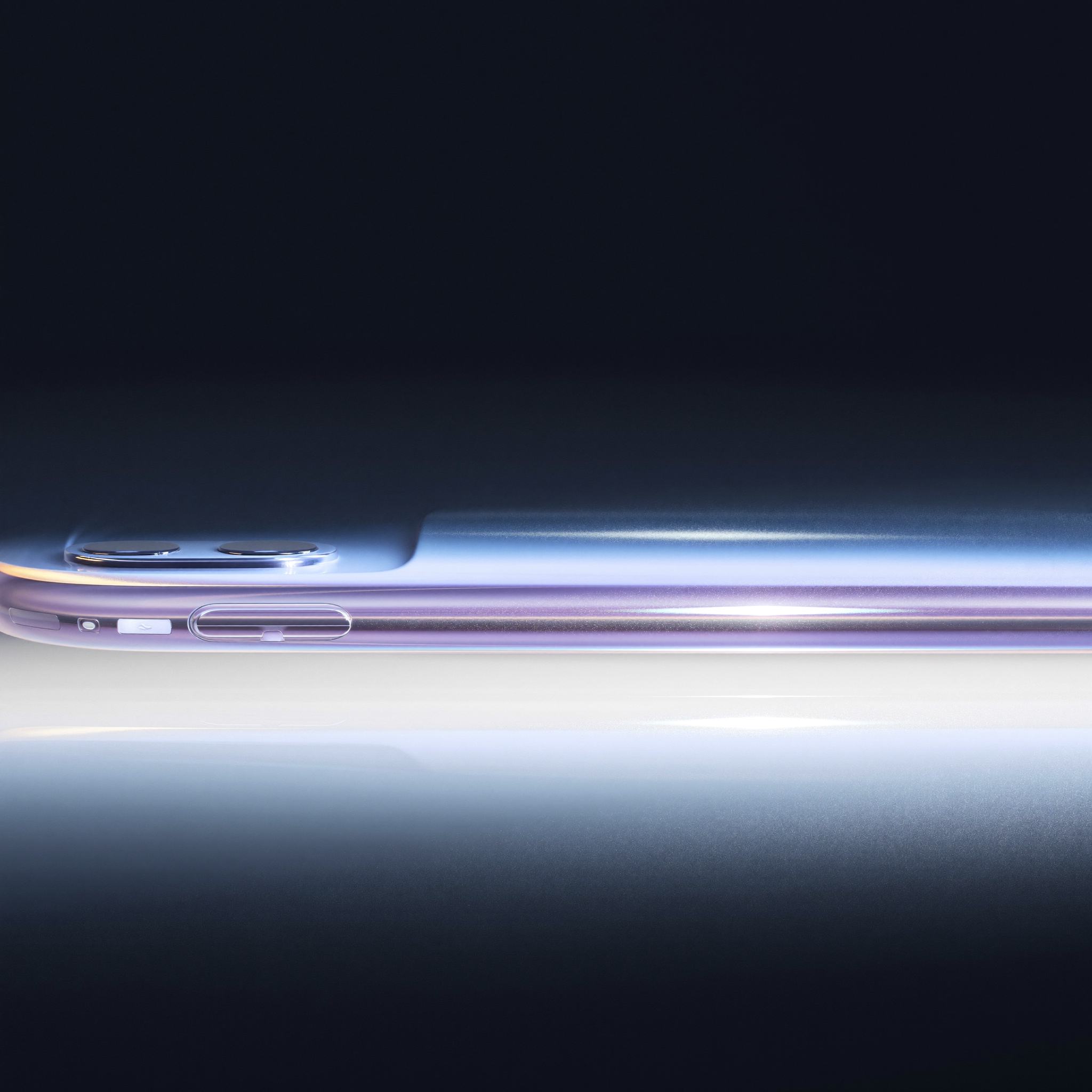 A lilac smartphone body in profile in a strip of cold light